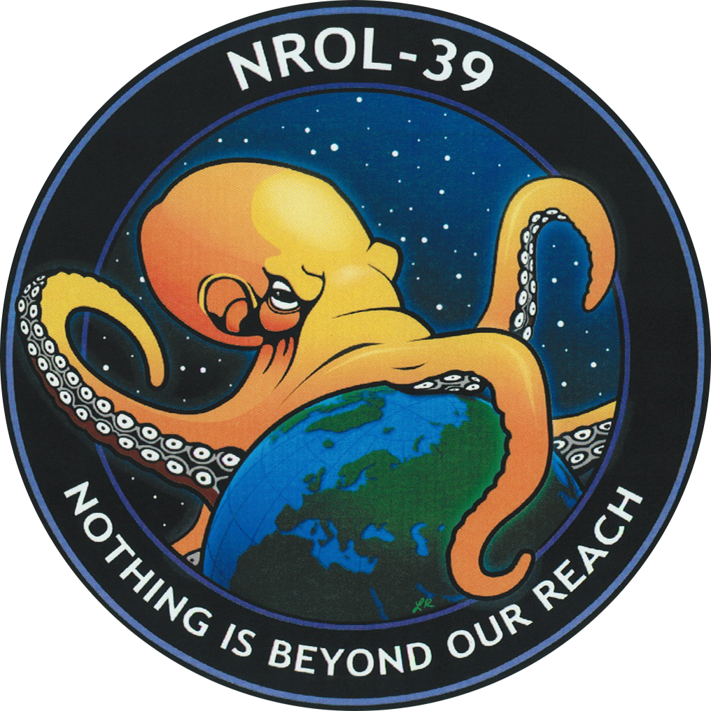 A cartoon octopus wrapping its tentacle around Earth, set against a starry space background. The top of the image has the text "NROL-39," and the bottom reads "Nothing is beyond our reach."