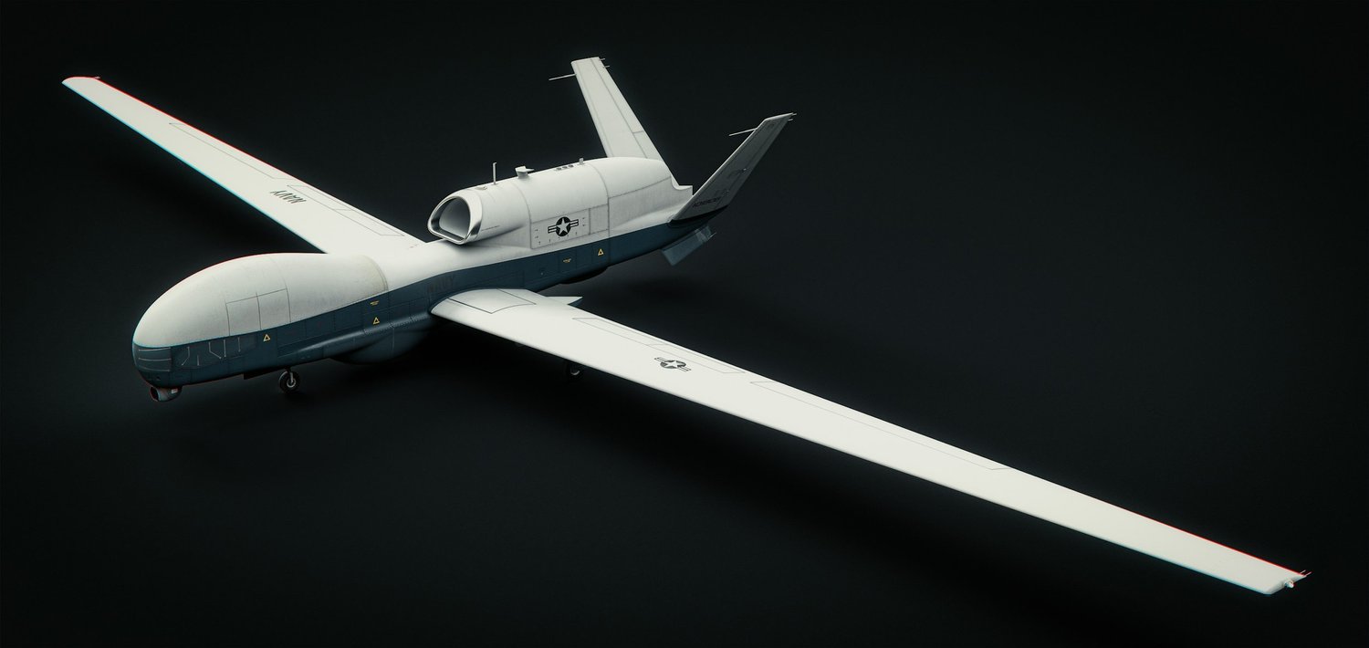 A model of a futuristic military drone aircraft with white and gray coloring, featuring a sleek, rounded nose, wing-mounted stabilizers, and military markings, set against a dark background.